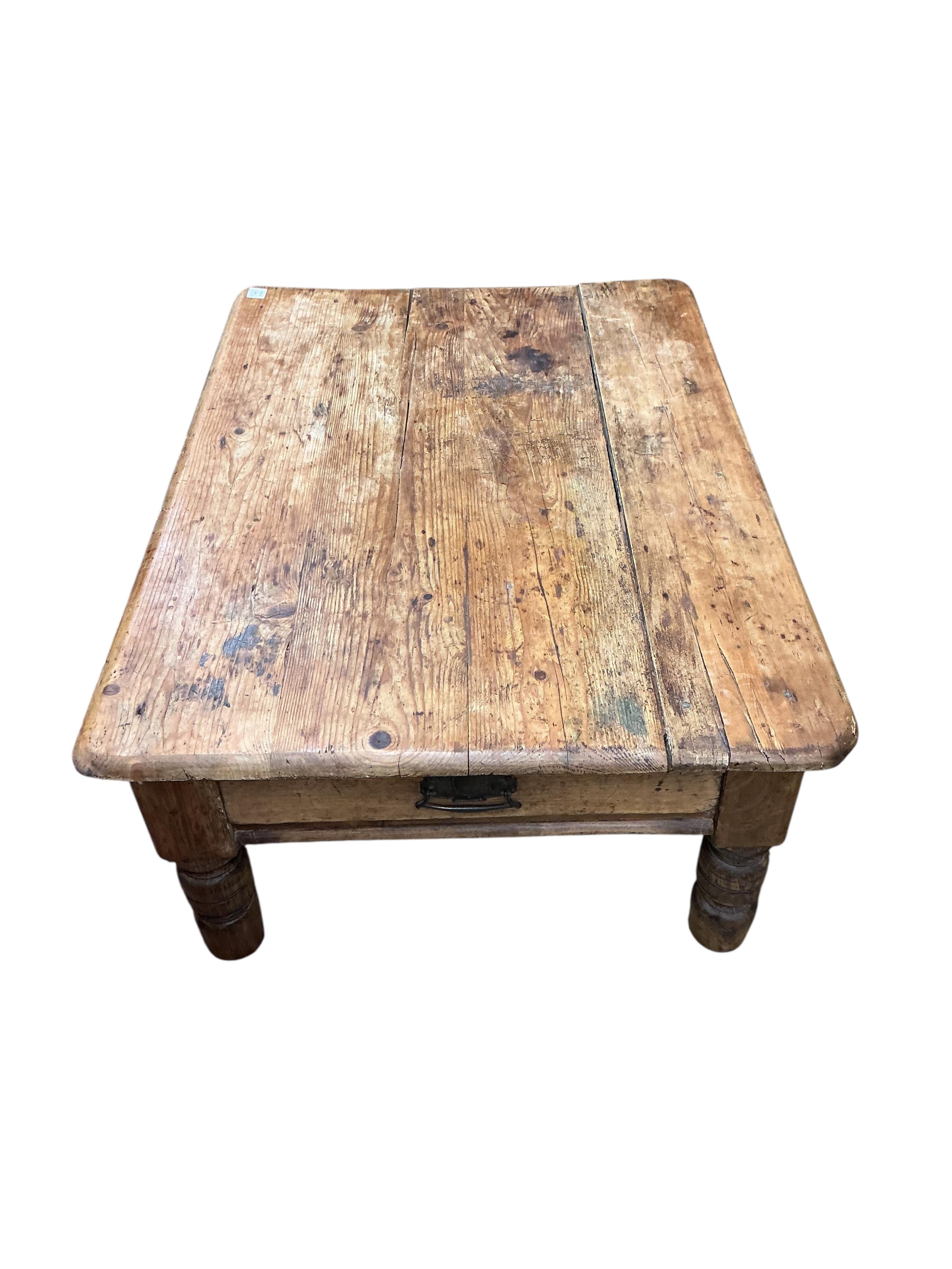 A Victorian rectangular pine coffee table, adapted from a kitchen table, width 120cm, depth 85cm, height 47cm